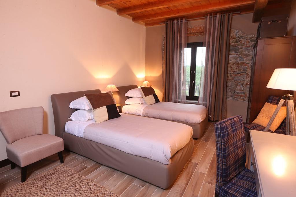 Equirelais Hotel Lomnago Quarto foto